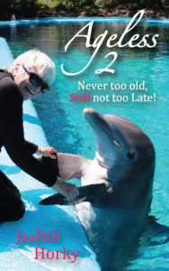 cover of the book Ageless 2 showing Judith Horky in a wet suit with a dolphin